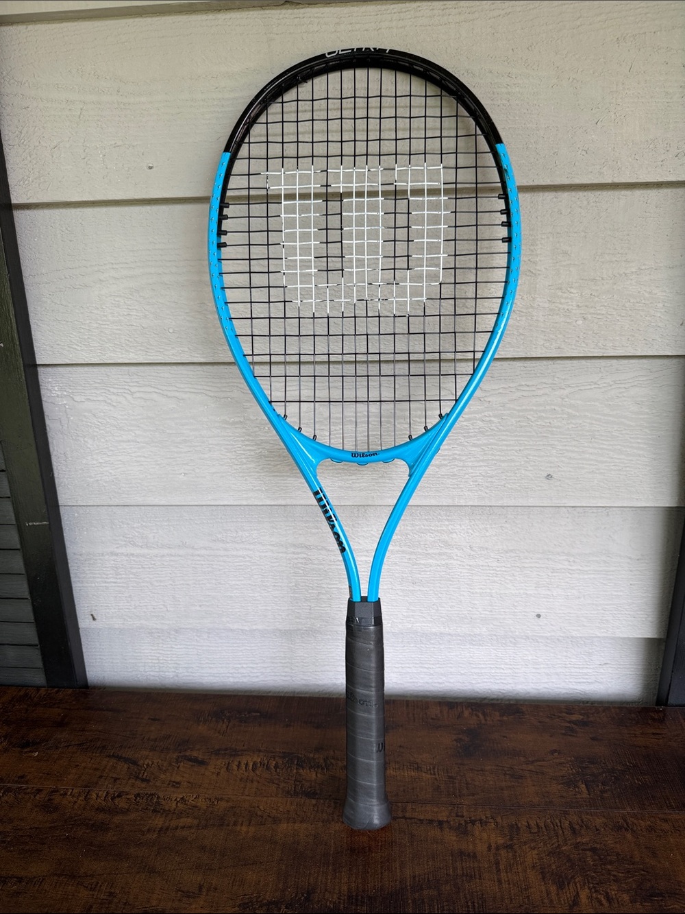 Wilson Blue and Black Tennis Racket with White Logo